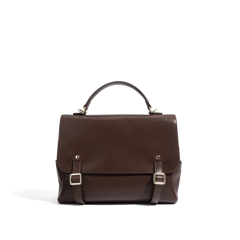 Sac à dos en cuir marron foncé avec poignée et boucles dorées