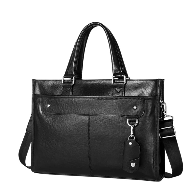 Mallette en cuir noir avec poignée et porte-clés sur fond blanc